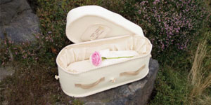 Woolen baby casket - available through Aroha Funerals